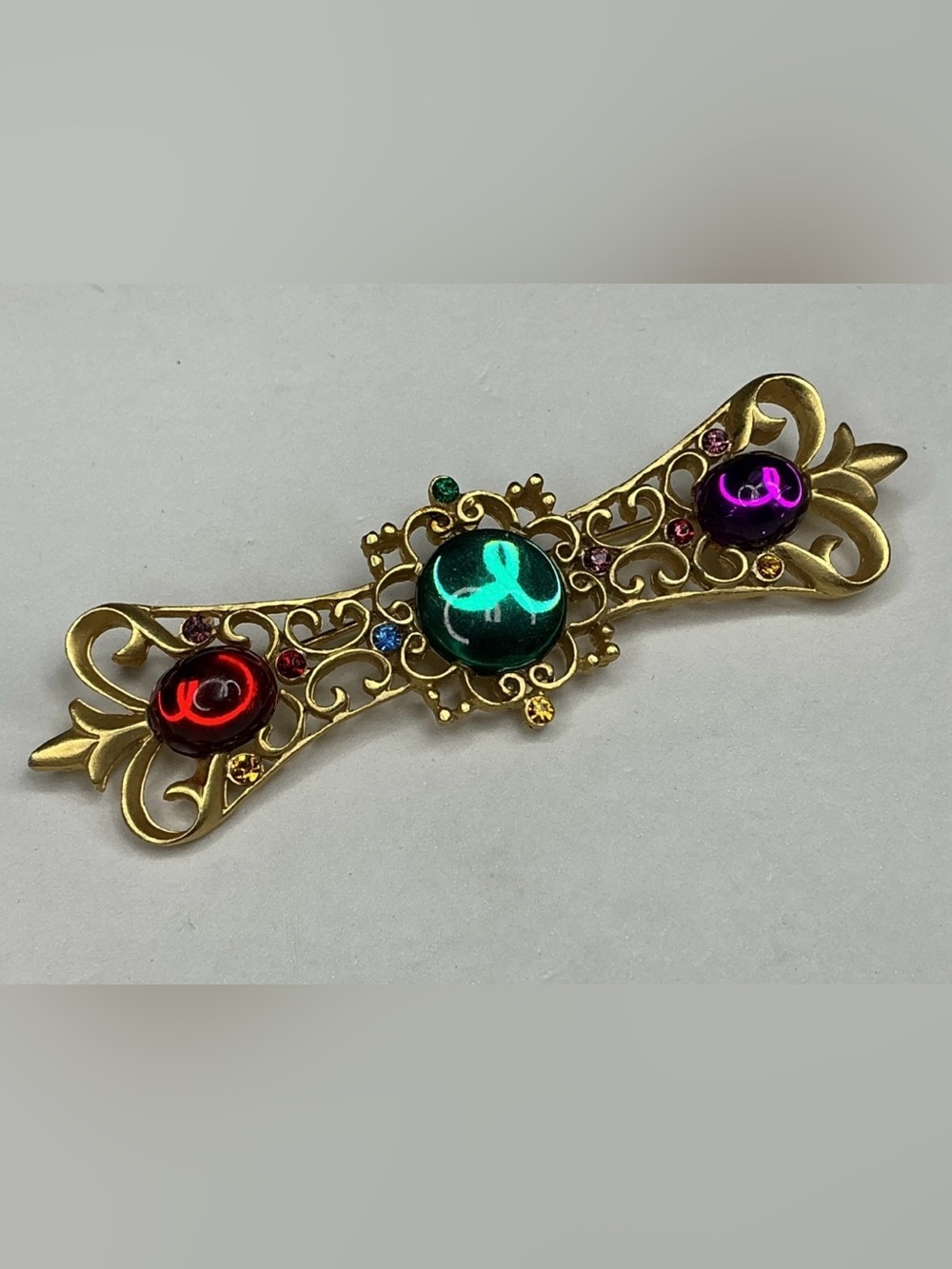Gold-Tone Multigem Filigree Brooch with Green, Red and Purple Cabochons